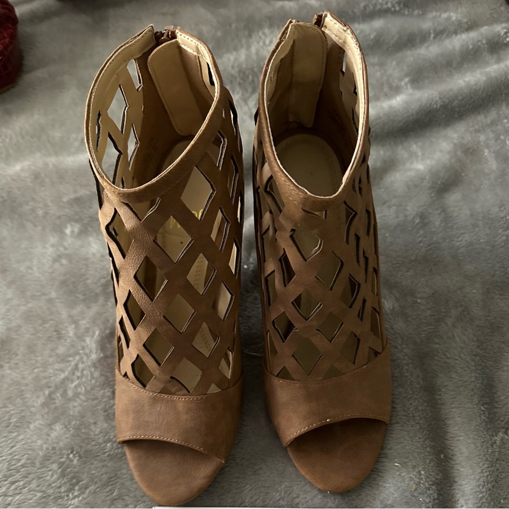 Cute boot heels with open toe.
